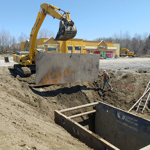 Travaux d'excavation et mise en place d'égouts pluviaux et sanitaires à Prévost